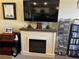 Close up view of the fireplace with a tv above it at 101 Waters Edge Pkwy, Temple, GA 30179