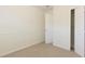 Carpeted bedroom featuring a closet, neutral paint and ceiling fan at 1316 Milstead Ave, Conyers, GA 30012