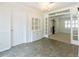 Formal dining room offering tiled floors, ample lighting and ornate trim detail at 1316 Milstead Ave, Conyers, GA 30012