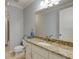 Bathroom featuring a granite countertop, modern sink and fixtures, and neutral color palette at 4820 Marina Ln, Mableton, GA 30126