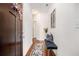 Inviting foyer with hardwood floors, bench, and decorative accents at 1530 Redbud Way, Tucker, GA 30083