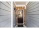 A welcoming entryway with stone accents and a decorative door at 1530 Redbud Way, Tucker, GA 30083