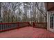 The outdoor deck is made of wood and features a back door entrance at 2070 Sweetgum Trl, Cumming, GA 30041