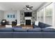 Bright living room features a fireplace and large windows providing lots of natural light at 2296 Whiteoak Se Dr, Smyrna, GA 30080