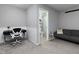 Living room with desk, a comfortable seating area and a partial bathroom at 2296 Whiteoak Se Dr, Smyrna, GA 30080