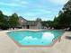 Enjoy community pool with lounge seating and well-maintained surroundings in a desirable location at 2296 Whiteoak Se Dr, Smyrna, GA 30080