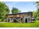 Spacious home featuring a deck, manicured lawn, and lovely exterior features at 2722 Glenbriar Ne Dr, Atlanta, GA 30345