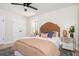 Neutral bedroom featuring double closets, a window overlooking the lawn, and stylish decorations at 2722 Glenbriar Ne Dr, Atlanta, GA 30345