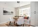 Charming eat-in kitchen area with window seat, modern pendant lighting and great natural light at 2722 Glenbriar Ne Dr, Atlanta, GA 30345