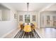 Dining room features modern pendant lighting, hardwood floors, and stylish decor at 2722 Glenbriar Ne Dr, Atlanta, GA 30345