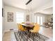 Dining room features modern pendant lighting, hardwood floors, and stylish decor at 2722 Glenbriar Ne Dr, Atlanta, GA 30345