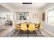 Beautiful dining room features modern pendant lighting, stylish decor, and easy access to kitchen at 2722 Glenbriar Ne Dr, Atlanta, GA 30345