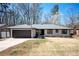 Charming one-story brick home with a two-car garage and a well-manicured lawn at 2722 Glenbriar Ne Dr, Atlanta, GA 30345