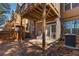 Backyard of home featuring a wooden patio cover and fenced yard at 7630 Glisten Ave # 304, Atlanta, GA 30328