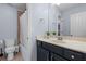 Bathroom features a vanity, mirror, tiled shower and toilet at 7630 Glisten Ave # 304, Atlanta, GA 30328