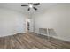 Bedroom featuring hardwood floors, a ceiling fan, and neutral walls at 7630 Glisten Ave # 304, Atlanta, GA 30328