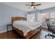 A comfortable bedroom with hardwood floors and ample natural light at 7630 Glisten Ave # 304, Atlanta, GA 30328
