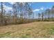 A level and spacious backyard offering endless possibilities for landscaping and outdoor enjoyment at 2716 Georgia 16, Carrollton, GA 30116