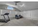 Bonus room with vaulted ceilings, large windows, lounge chairs, and treadmill at 2716 Georgia 16, Carrollton, GA 30116