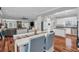 Open floor plan with a dining nook, living room, and white kitchen at 2716 Georgia 16, Carrollton, GA 30116