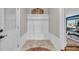 Inviting mud room with custom built-in storage, decorative rug, and plenty of space for organization at 2716 Georgia 16, Carrollton, GA 30116