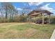 Outdoor shed or outbuilding for storing equipment and vehicles on the property at 2716 Georgia 16, Carrollton, GA 30116