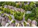 Aerial view of a neighborhood featuring winding streets and mature trees at 2750 Vinings Orchard Se Cir, Atlanta, GA 30339