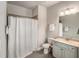 Clean bathroom with a shower/tub combo, tile floors, and a vanity with storage at 2750 Vinings Orchard Se Cir, Atlanta, GA 30339