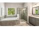 Beautiful bathroom features a soaking tub, glass shower, and double vanity at 2750 Vinings Orchard Se Cir, Atlanta, GA 30339
