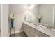 Bathroom features double sinks with granite countertops and modern fixtures at 2750 Vinings Orchard Se Cir, Atlanta, GA 30339