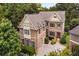 Charming two-story brick home with landscaped front yard and attached garage at 2750 Vinings Orchard Se Cir, Atlanta, GA 30339