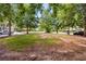 Expansive front lawn with mature shade trees in a lovely neighborhood at 2750 Vinings Orchard Se Cir, Atlanta, GA 30339