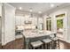 Bright kitchen with island seating, stainless appliances, and granite counters at 2750 Vinings Orchard Se Cir, Atlanta, GA 30339