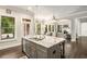 Spacious kitchen island featuring a sink, granite countertops, and pendant lighting at 2750 Vinings Orchard Se Cir, Atlanta, GA 30339