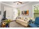 Comfortable living room with hardwood floors, natural light, and classic decor at 2750 Vinings Orchard Se Cir, Atlanta, GA 30339