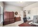 Well-lit office space features wooden storage cabinets, desk, and a cozy workspace at 2750 Vinings Orchard Se Cir, Atlanta, GA 30339