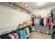 Spacious walk-in closet with shelves and hanging racks for maximum storage at 2750 Vinings Orchard Se Cir, Atlanta, GA 30339