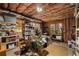 Unfinished basement providing ample storage or potential to customize, with windows and exposed beams at 2314 English Ivy Se Ct, Atlanta, GA 30339