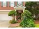 Inviting front porch with manicured landscaping and mailbox at 2314 English Ivy Se Ct, Atlanta, GA 30339