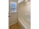 Clean, well-lit bathroom featuring a shower at 70 Wall St, Hampton, GA 30228
