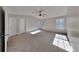 Expansive main bedroom with carpeted floors, bright windows, and ample closet space at 955 Magnolia Gardens Walk, Mcdonough, GA 30253
