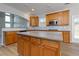 Modern kitchen with a mosaic tile backsplash, ample counter space, and stainless steel appliances at 1368 Fall River Dr, Conyers, GA 30013