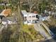 Birds eye view of house with large lawn, modern carport, and unique design at 1045 Shepherds Ne Ln, Atlanta, GA 30324