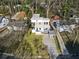 Aerial shot of modern house with well maintained lawn and unique carport design at 1045 Shepherds Ne Ln, Atlanta, GA 30324