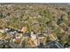 Overhead view of a modern home in a wooded neighborhood showcasing the property's setting at 1045 Shepherds Ne Ln, Atlanta, GA 30324