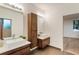 Bright bathroom featuring double sinks, modern fixtures, and wood cabinets at 1045 Shepherds Ne Ln, Atlanta, GA 30324