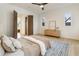 Bedroom featuring a modern bed, hardwood floors, and natural light from a large window at 1045 Shepherds Ne Ln, Atlanta, GA 30324
