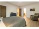 Comfortable bedroom featuring a bed, dresser, and chair at 1045 Shepherds Ne Ln, Atlanta, GA 30324