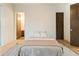 Bright bedroom with a bed, modern decor, and light wood floors creating a cozy and inviting atmosphere at 1045 Shepherds Ne Ln, Atlanta, GA 30324