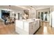 Kitchen island featuring white countertops, sleek cabinetry, and open floorplan at 1045 Shepherds Ne Ln, Atlanta, GA 30324